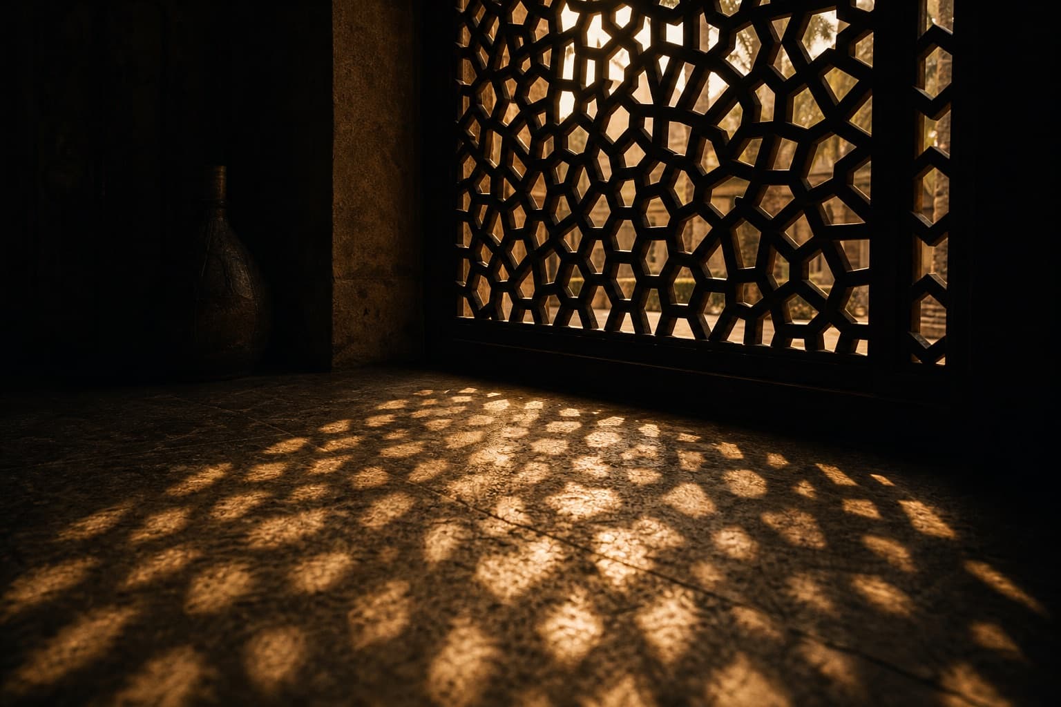 Warm desert light filtering through a wooden Arabic mashrabiya lattice screen, casting an intricate geometric shadow pattern across a stone floor.